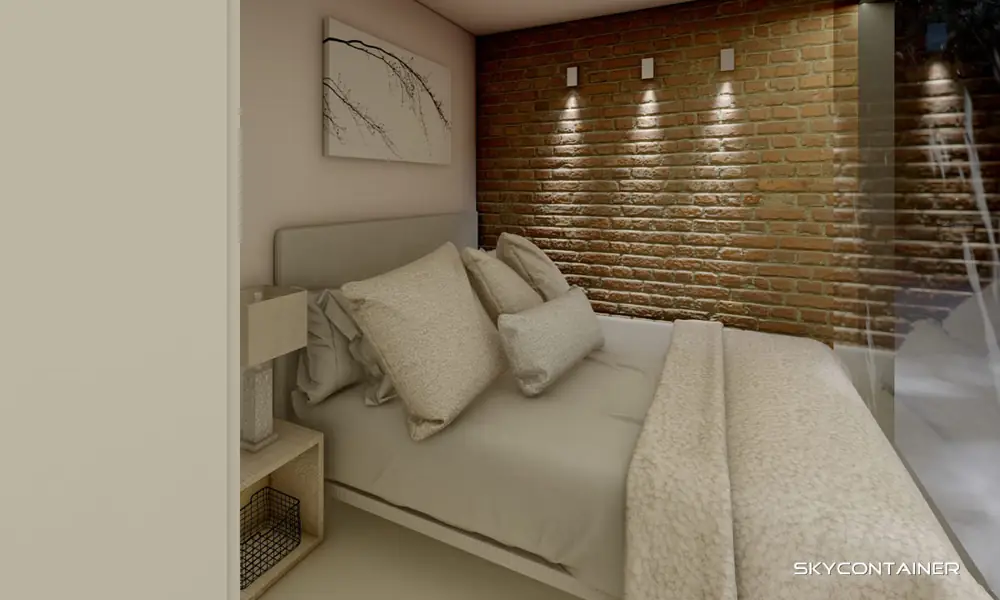 Schlafbereich mit Bett und strukturierter Wand