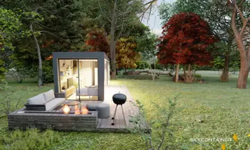 Schmales Tiny-Gartenhaus mit stirnseitiger Glasfront, Holzdeck und Feuerstelle