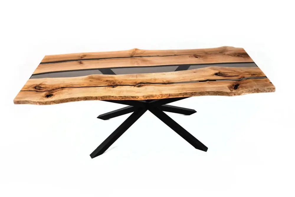 Holztisch mit natürlicher Baumkante und sternförmigem Untergestell