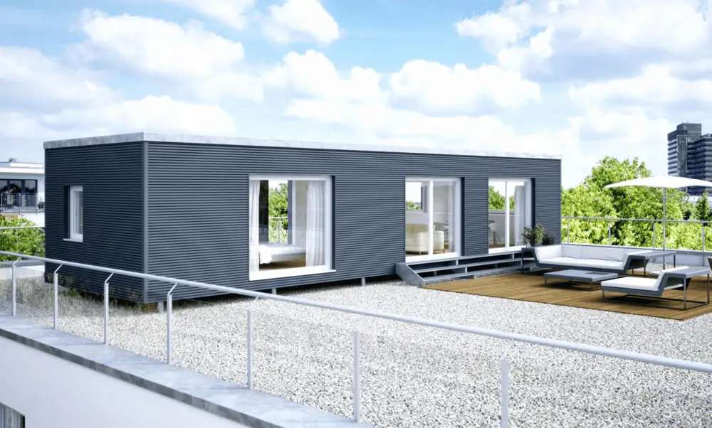 Langer grauer Wohncontainer mit zwei Glastüren und ebener Terrasse
