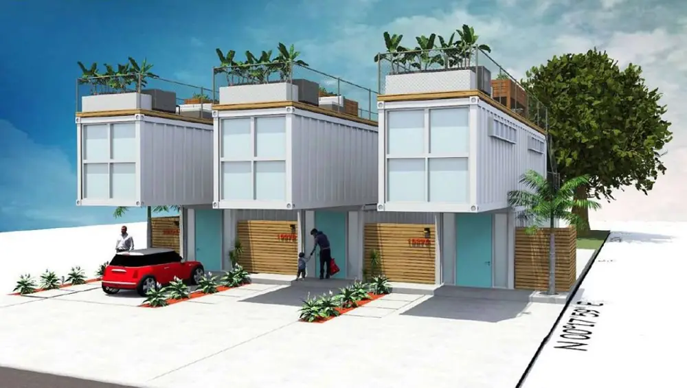 White container complex with planted roof terraces and garage openings