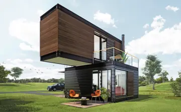 Tiny-House-Konzept mit Holz-Obergeschoss über einem dunklen Wohnmodul