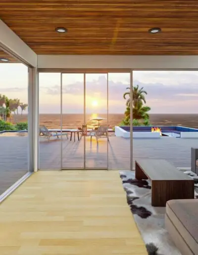Open living area with a timber ceiling and sea views through the glazing