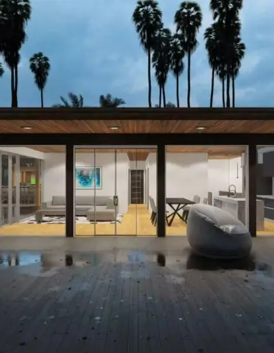 Living room with a sofa arrangement, coffee table and views of an illuminated pool