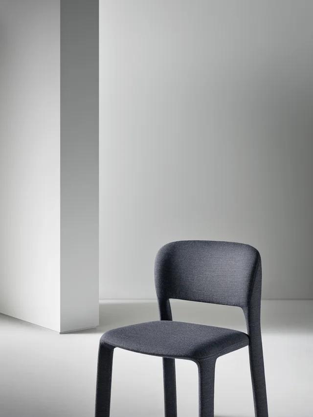 Bonaldo Artemis: Dark fully upholstered chair with soft contours · View 3