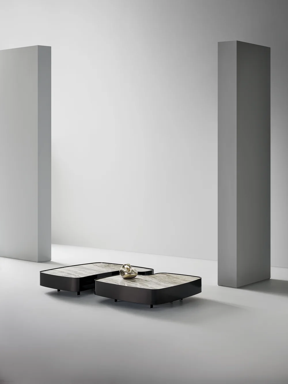 Bonaldo Aspen: Two low tables with irregular pale tops and dark edging · View 1