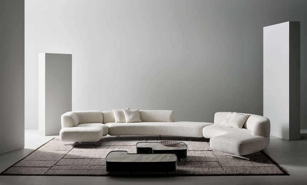 Bonaldo Grant: Long pale sofa with flowing curves and recessed supports · View 1