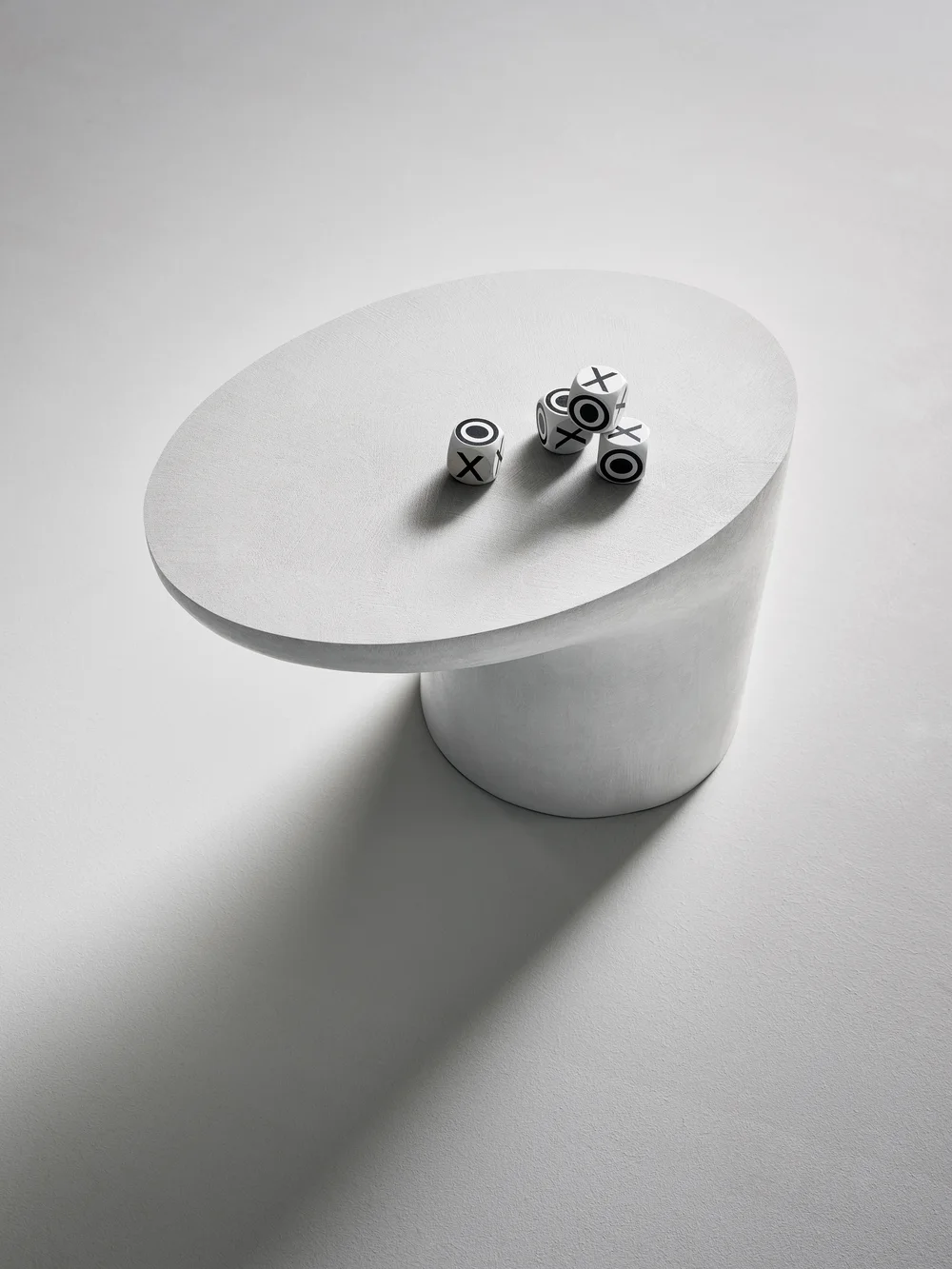 Bonaldo Sloan: Pale oval side table with a projecting top and substantial base · View 1