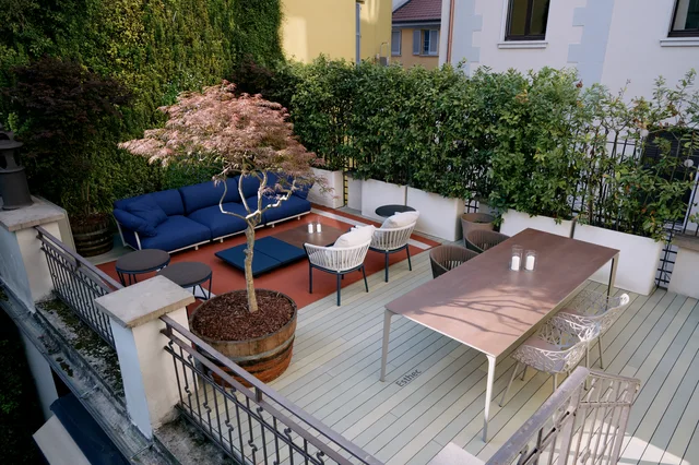 Fast Salvioni Milano Durini Terraces: Planted terrace with white and blue lounges and dining areas · View 3