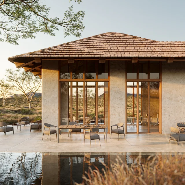 VONDOM AFRICA: Essplatz an einer Glasfront vor einem pavillonartigen Haus am Wasser