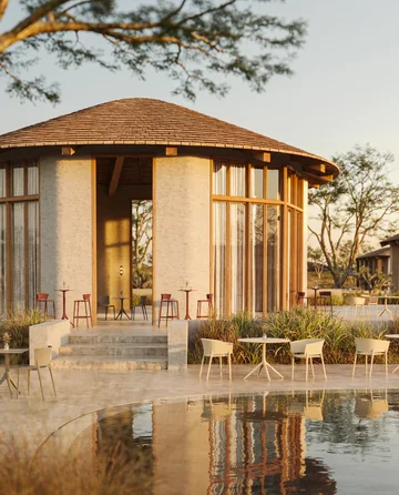 VONDOM AFRICA: Sitzmöbel vor einem runden Pavillon mit Spiegelung im Wasser