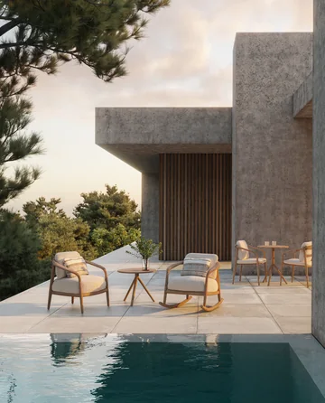 VONDOM FUSTA: dining area beneath a concrete overhang with a garden view