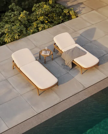 VONDOM FUSTA: overhead view of two pale timber-framed loungers beside a pool