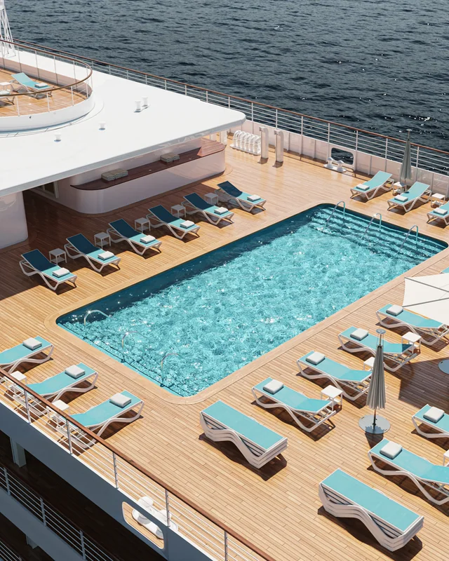 VONDOM LOVE: Pooldeck mit vielen Liegen und Sonnenschirmen von oben