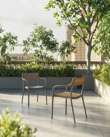 VONDOM MADISON: different chair finishes side by side beside a planted bed