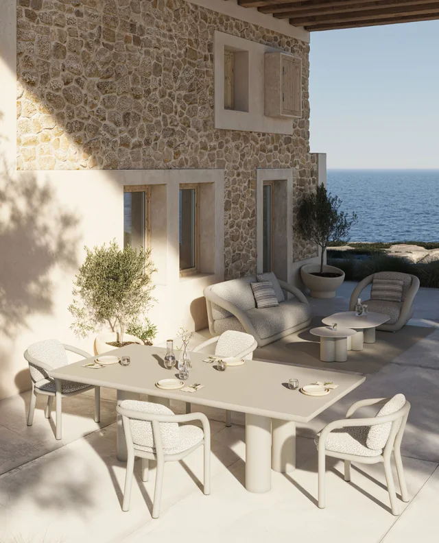 VONDOM MEL-Bildstrecke: gedeckter Essplatz und Lounge auf einer Terrasse mit Meerblick