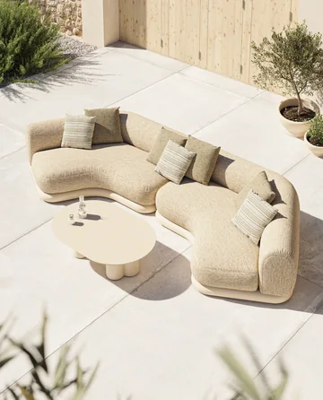 VONDOM MEL: overhead view of a curving lounge with pale cushions and tables