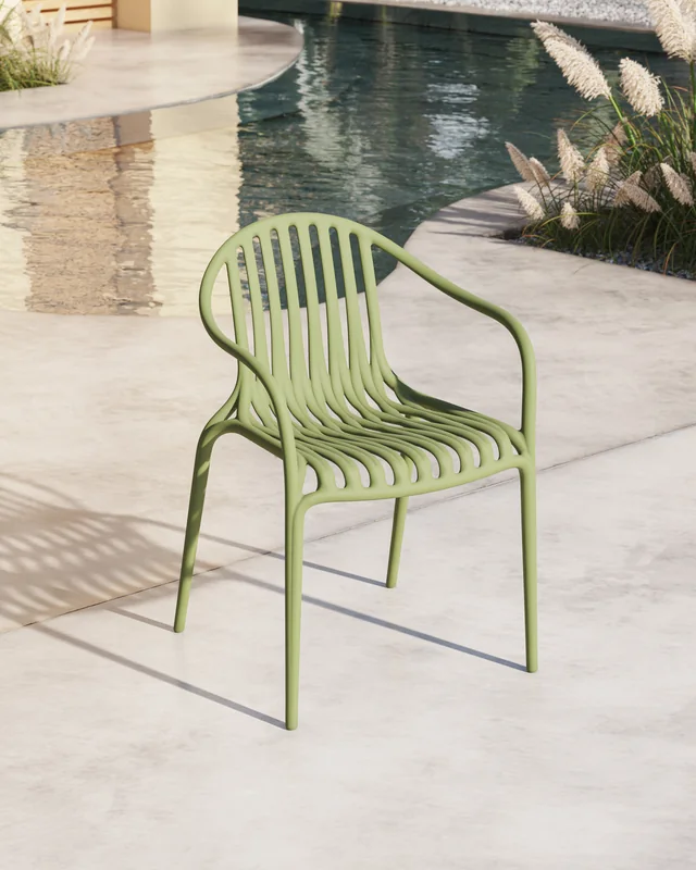 VONDOM PALM: grüner Stuhl mit offenem gerastertem Sitz und Rücken in der Schrägansicht