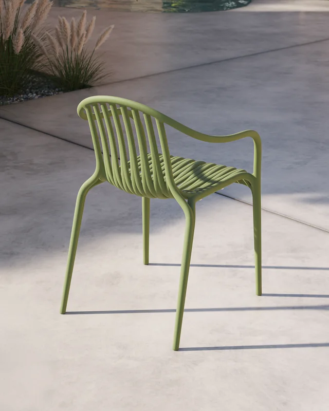 VONDOM PALM: seitliche Ansicht eines grünen Stuhls mit gebogenen Armlehnen