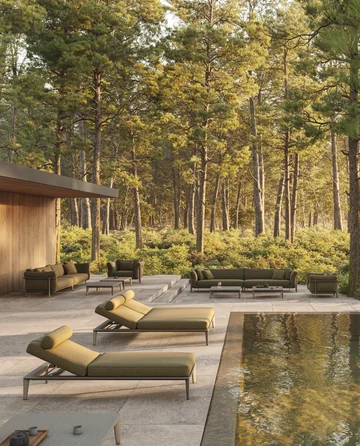 VONDOM PASADENA: upholstered sun lounger beside a pool and green landscape