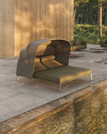 VONDOM PASADENA: Daybed mit gerundetem Sonnendach auf einer Terrasse